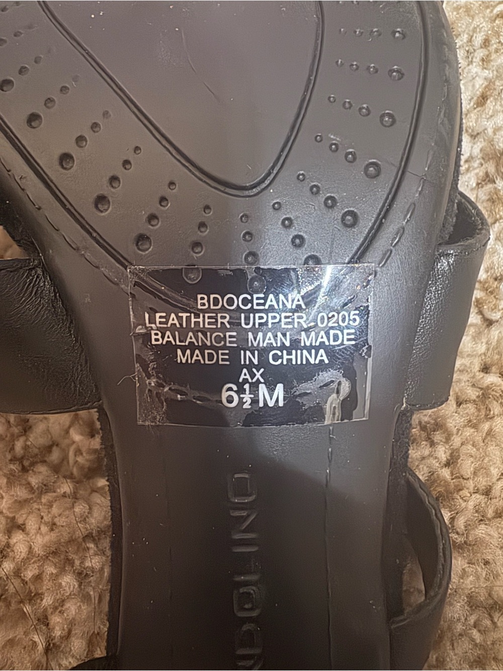 Woman’s Black Leather Slide Sandal